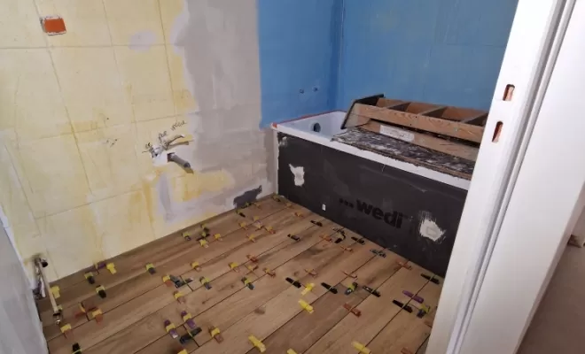 Rénovation d'une salle de bain avec carrelage imitation bois à Saint-Chamond, proximité de Vienne, Barbosa David Carrelages